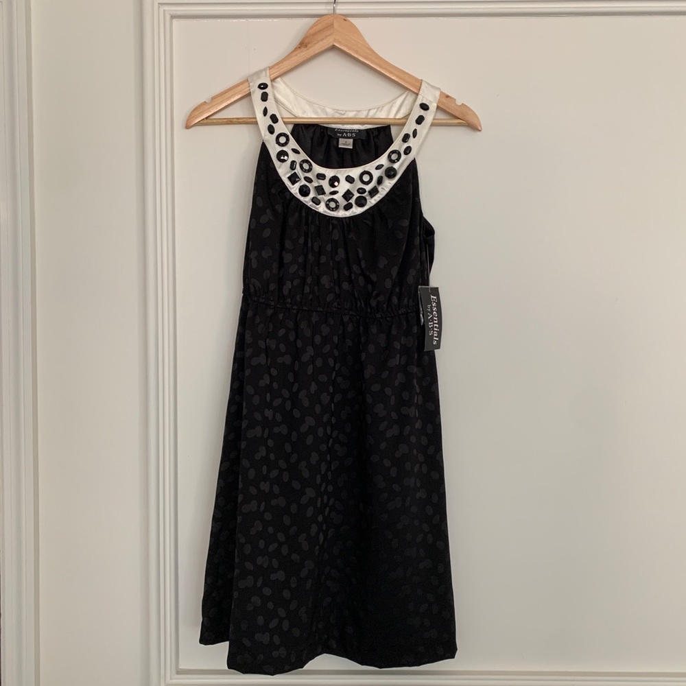 ABS dress with jeweled detail at neckline